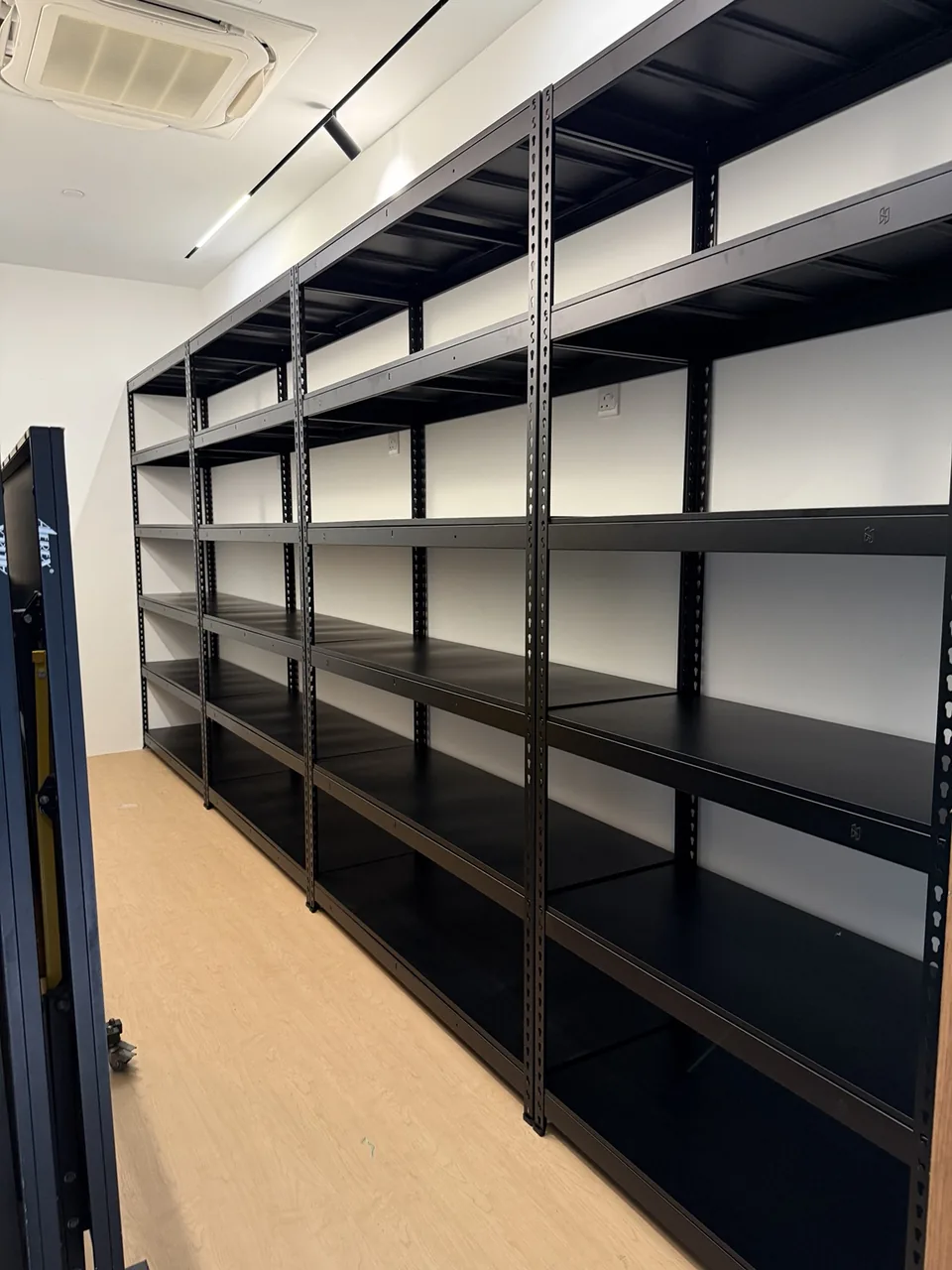 Long straight commercial storage row, viewed from the opposite end